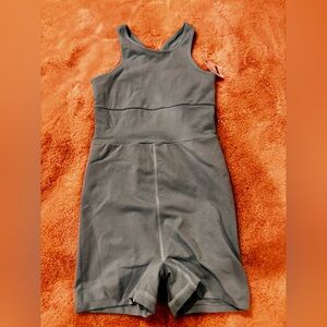 Size xs-s Free people movement romper in the color cascade